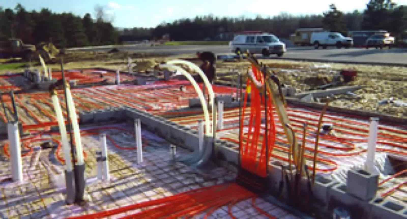 Geothermal system ground loop PEX installation by Mazure's