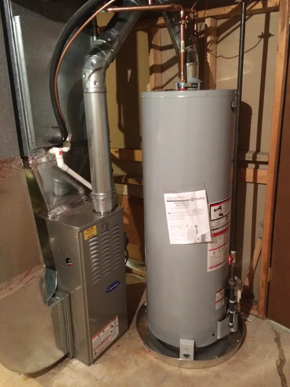 Water heater replacement with new piping connections by Mazure's